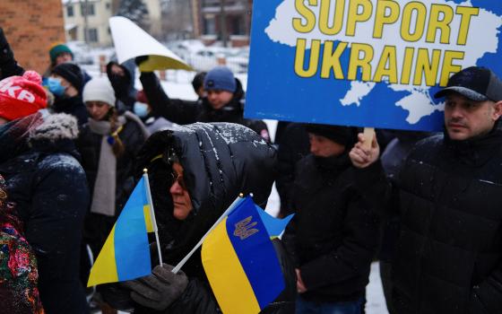 Ukraine supporters rally outside St. Constantine Ukrainian Catholic Church in Minneapolis Feb. 24, 2022, after Russia launched a massive military operation against Ukraine. (CNS photo/Stephen Maturen, Reuters)