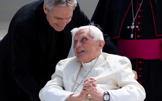 Retired Pope Benedict XVI speaks to his private secretary, Archbishop Georg Gänswein, at Germany's Munich Airport before his departure to Rome June 22, 2020. (CNS photo/Sven Hoppe, pool via Reuters)