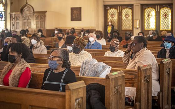 Parishioners attend Mass at St. Barbara Catholic Church Feb. 6 in Philadelphia. (CNS/Chaz Muth)