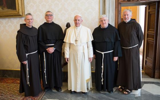  Pope Francis poses with the superiors of the four main men's branches of the Franciscan family during a meeting at the Vatican, April 10, 2017. (CNS photo/Vatican Media)