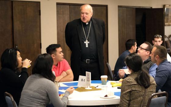 Bishop Robert McElroy of San Diego chats with participants in the closing session of the San Diego Diocese's synod on young adults at Mission San Diego de Alcalá Nov. 9, 2019. He was among 21 new cardinals named by Pope Francis May 29. (CNS)