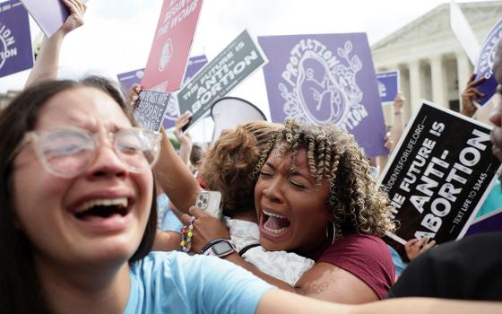 Pro-life demonstrators in Washington celebrate outside the Supreme Court June 24 as the court overruled the landmark Roe v. Wade abortion decision in its ruling in the Dobbs case on a Mississippi law banning most abortions after 15 weeks. (CNS/Reuters/Eve