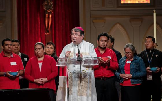 Archbishop Christophe Pierre, apostolic nuncio to the United States, speaks at the the Georgia International Convention Center in College Park, Ga., June 18, 2022, during the last day of the Atlanta Archdiocese's 25th eucharistic congress. 