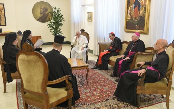 Pope Francis listens to Orthodox Archbishop Job of Telmessos while meeting a delegation representing the Ecumenical Patriarchate of Constantinople at the Domus Sanctae Marthae at the Vatican June 30 (CNS/Vatican Media)