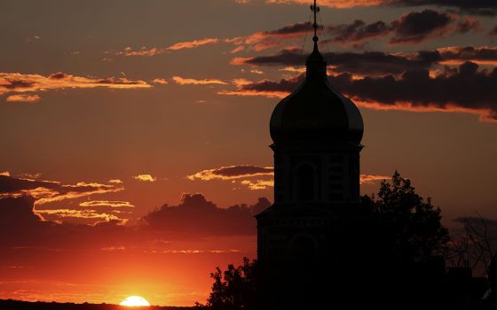 A church is seen at sunset July 12 in Kharkiv, Ukraine, during the Russian invasion. (CNS/Reuters/Nacho Doce)