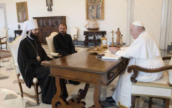 Pope Francis talks with Metropolitan Anthony of Volokolamsk, left, head of external relations for the Russian Orthodox Church, at the Vatican in this Aug. 5, 2022, file photo. 