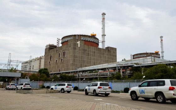 A motorcade transporting the International Atomic Energy Agency expert mission arrives at the Zaporizhzhia nuclear power plant in the course of Ukraine-Russia conflict outside the Russian-controlled city of Enerhodar in eastern Ukraine Sept. 1, 2022. 