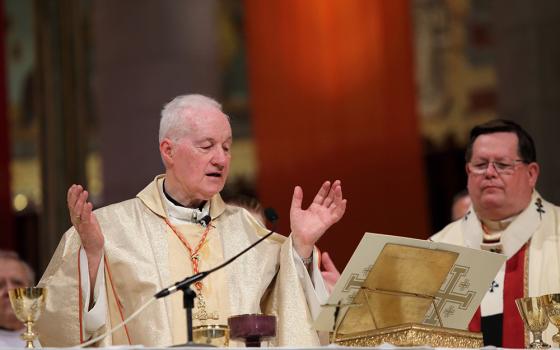 Cardinal Marc Ouellet, left, and Quebec Cardinal Gérald Lacroix concelebrate Mass in 2018 at the Basilica of Ste.-Anne-de-Beaupré in Ste.-Anne-de-Beaupré, Quebec. (CNS/Présence/Philippe Vaillancourt)