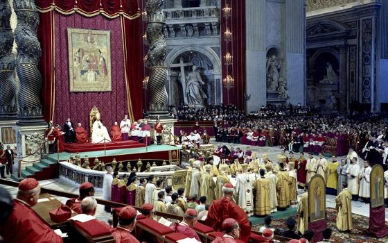 Pope Paul VI presides over a meeting of the Second Vatican Council in St. Peter's Basilica at the Vatican in 1963. (CNS/Catholic Press photo)