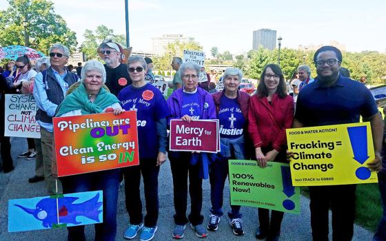 Collaborative Center for Justice staff and volunteers rally for climate justice at the Connecticut state capitol in 2019. (Courtesy of Dwayne David Paul)