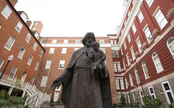 Isaac Hawkins Hall, on the campus of Georgetown University, is seen in this file photo from April 4, 2017. Previously known as Mulledy Hall and later Freedom Hall, it was renamed in 2017 for one of the 272 enslaved men, women and children sold to plantation owners by Georgetown's Jesuit community in order to finance the school. Hawkins was the first enslaved person listed in the sale documents. (OSV News/Tyler Orsburn, CNS)