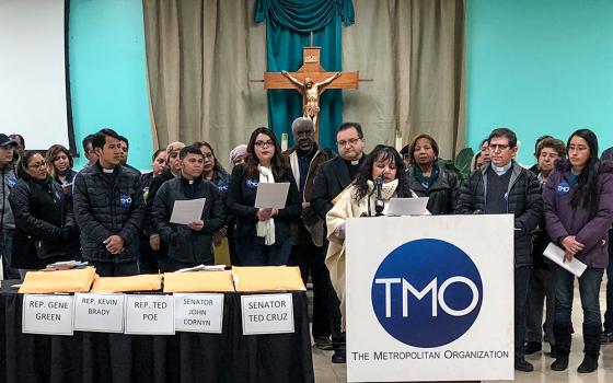 On Jan. 18, 2018, recipients of the Deferred Action for Childhood Arrivals program and their supporters, including clergy, participate in a news conference sponsored by The Metropolitan Organization at St. Leo the Great Catholic Church in Aldine, Texas. They gathered thousands of postcards to be mailed to congressional members urging they keep the DACA program intact. (CNS/Courtesy of TMO)