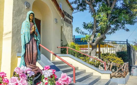 A statue of Our Lady of Guadalupe is seen outside of Dolores Mission Church in Los Angeles. (NCR photo/Dan Morris-Young)