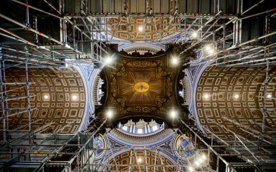 Canopy of baldachin seen from below with scaffolding. 