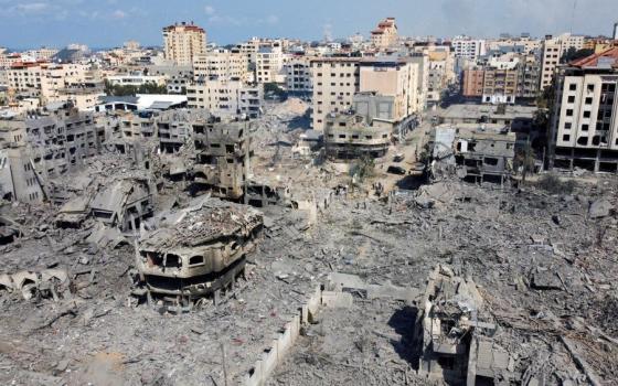 Buildings destroyed by Israeli airstrikes are seen in Gaza City Oct. 10, 2023. Israel launched airstrikes on the Gaza Strip in retaliation for the Oct. 7 assault by Hamas. 