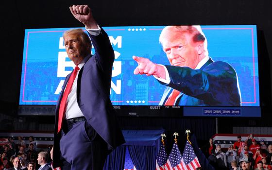 Republican presidential nominee and former U.S. President Donald Trump gestures to the crowd at the conclusion of his final campaign rally on Election Day, Nov. 5, at Van Andel Arena in Grand Rapids, Michigan. Trump garnered the 270 electoral votes needed to clinch the presidency. (OSV News/Reuters/Brian Snyder)