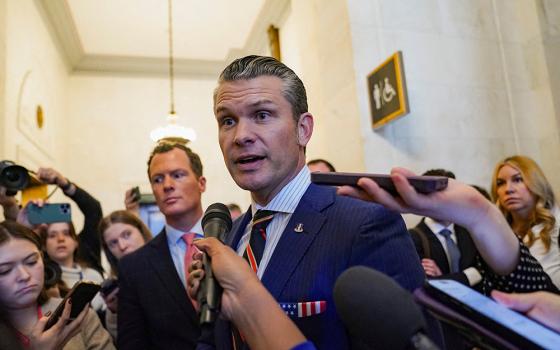 Defense secretary nominee Pete Hegseth speaks with the media as he departs a meeting on Capitol Hill Nov. 21 in Washington. (OSV News/Reuters/Nathan Howard)