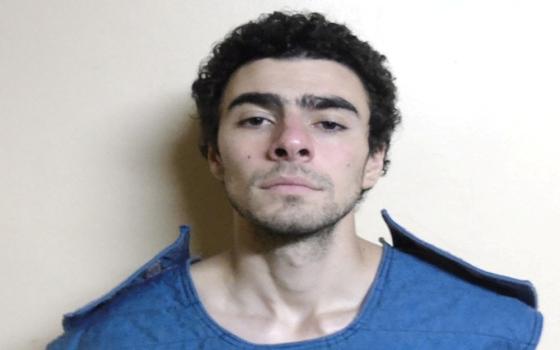 Luigi Mangione, 26, a suspect in the New York City killing of UnitedHealth executive Brian Thompson, poses for a booking photograph at the State Correctional Institution in Huntingdon, Pa., Dec. 9. (OSV News/Pennsylvania Department of Corrections handout via Reuters)