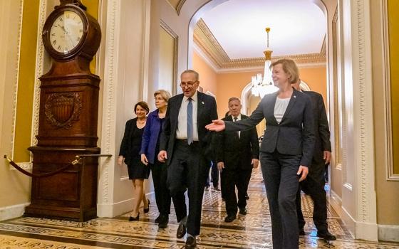 From left: Sen. Amy Klobuchar, D-Minn., Sen. Elizabeth Warren, D-Mass., Chuck Schumer D-N.Y., Sen. Dick Durbin, D-Ill., and Sen. Tammy Baldwin, D-Wis., gather on Capitol Hill Dec. 3, 2024, in Washington, after Senate Democratic leadership elections for the next session of Congress. (AP/Mark Schiefelbein)