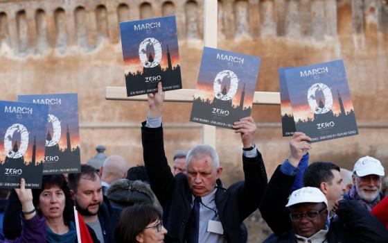 Clerical sex abuse survivors and their supporters rally outside Castel Sant'Angelo in Rome in this Feb. 21, 2019, file photo. (CNS/Paul Haring)