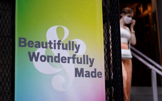 A banner hangs outside St. Francis of Assisi Church in New York City following an annual "Pre-Pride Festive Mass" June 26, 2021. The liturgy, hosted by the parish's LGBT Ministry, is traditionally celebrated on the eve of the city's Pride march.