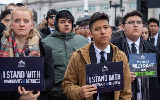 Students of Jesuit schools take part in a public demonstration for immigration reform and environmental justice outside Union Station in Washington D.C. Nov. 18 on the final day of the Ignatian Family Teach-in for Justice. (Ignatian Solidarity Network)