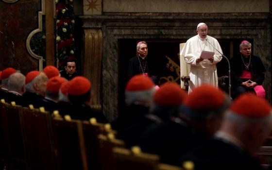 Pope Francis speaks during the traditional greetings to the Roman Curia in the Sala Clementina (Clementine Hall) of the Apostolic Palace at the Vatican on Dec. 22, 2016. (AP/Gregorio Borgia, Pool)