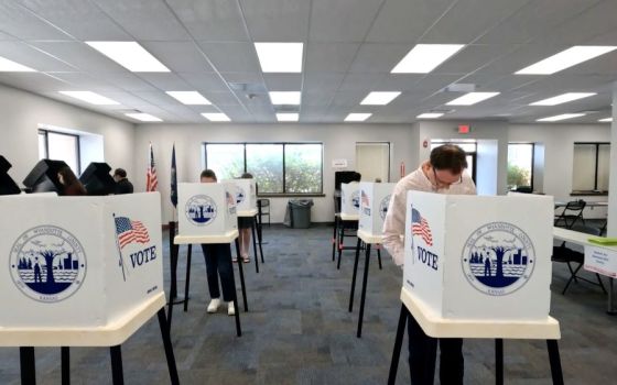 Voters mark their ballots during the primary election and abortion referendum at a Wyandotte County polling station in Kansas City, Kansas, Aug. 2. (CNS/Reuters/Eric Cox)