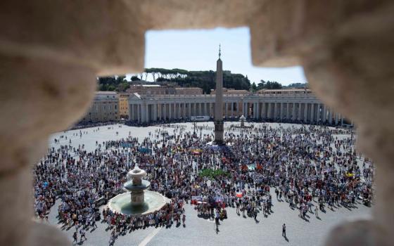 The crowd in St. Peter's Square is pictured as Pope Francis leads the Angelus from the window of his studio overlooking the square at the Vatican Sept. 5. (CNS/Vatican Media)