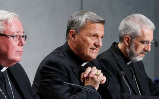 Cardinal Mario Grech, secretary-general of the Synod of Bishops, speaks during a news conference to present an update on the synod process at the Vatican Aug. 26.