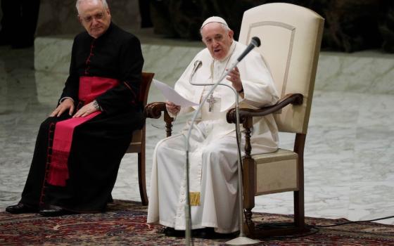 Pope Francis delivers his message on the occasion of the weekly general audience in the Paul VI hall at the Vatican Oct. 21. (AP/Gregorio Borgia)