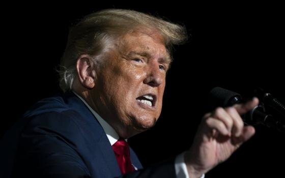 President Donald Trump speaks during a campaign rally at Orlando Sanford International Airport Oct. 12 in Sanford, Florida. (AP Photo/Evan Vucci)