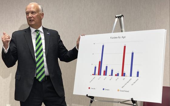 Nebraska Attorney General Doug Peterson discusses the findings of a statewide Catholic church sex abuse investigation on Thursday, Nov. 4, 2021, at a Nebraska Department of Justice office in Lincoln, Neb.  (AP Photo/Grant Schulte)