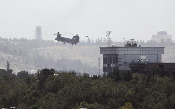 U.S. personnel were evacuated from the U.S. embassy in Kabul, the Afghan capital, as Taliban insurgents broke through the city's defensive line Aug. 15. (AP/Rahmat Gul)