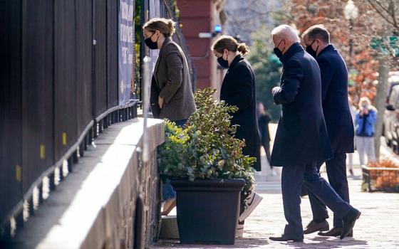 President Joe Biden and family members enter Holy Trinity Catholic Church in Washington Jan. 24. (CNS/Reuters/Erin Scott)