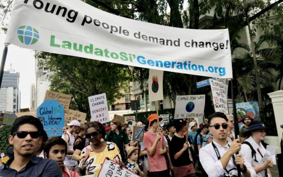 Catholics in Brisbane, Australia, take part in a global climate strike March 15 protesting a lack of action by government leaders in addressing climate change. (Laudato Si' Generation)