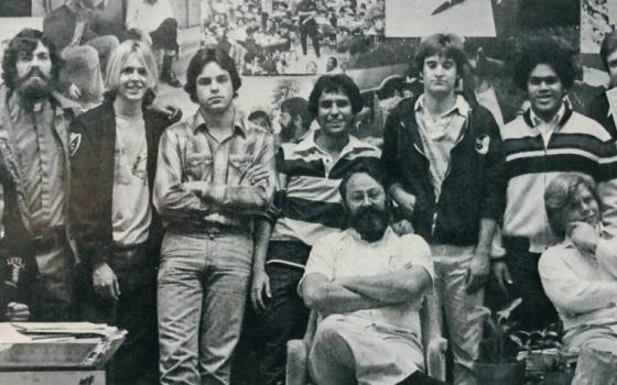 Jesuit Fr. James Rude, seated center, with CAM coordinators in a 1978 yearbook photo for the Christian Action Movement at Loyola High School. Standing second from right is the author, Patrick Whelan. (Loyola High School yearbook staff)