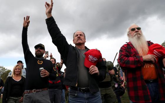 People with "Make America Great Again" hats at a rally in Portland, Oregon, Sept. 26 (CNS/Reuters/Leah Millis)