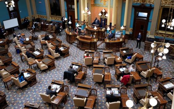 Michigan Lt. Gov. Garlin Gilchrist opens the state's Electoral College session at the state Capitol in Lansing Dec. 14, as the state cast all of its votes for President-elect Joe Biden. (CNS, pool via Reuters/Carlos Osorio)