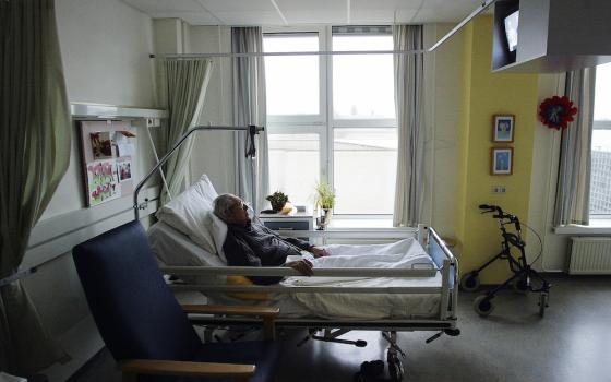 An unidentified man with Alzheimer's disease, who refused to eat, sleeps peacefully the day before passing away in a nursing home in Utrecht, Netherlands. (CNS/Reuters/Michael Kooren)