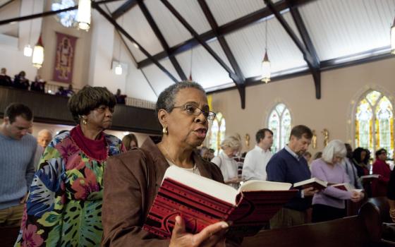 People sing during Mass at St. Joseph's Catholic Church in Alexandria, Virginia, in 2011. (CNS/Nancy Phelan Wiechec)