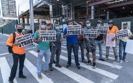 Union members in New York City hold a strike July 2. (CNS/Reuters/Sipa USA/Lev Radin)