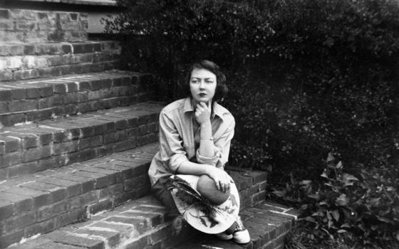  Catholic writer Flannery O'Connor sits on the steps of her home in Milledgeville, Georgia, Sept. 22, 1959. (CNS/Atlanta Journal-Constition, via AP, courtesy "Flannery"/Floyd Jillson)