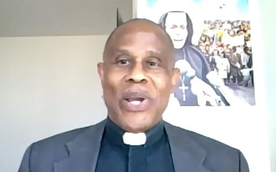 Fr. Bryan Massingale accepts Pax Christi USA's "Teacher of Peace" award July 31 during the organization's national conference, held via Zoom. (NCR screenshot)