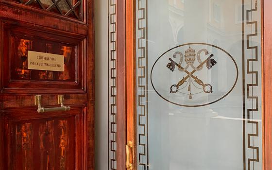 The door into the Congregation for the Doctrine of the Faith inside the Vatican's Palace of the Holy Office (NCR photo/Joshua J. McElwee)