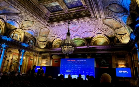 The National Conservatism event gets underway Feb. 4 in the ballroom of Rome’s Grand Hotel Plaza. (NCR photo/Joshua J. McElwee)