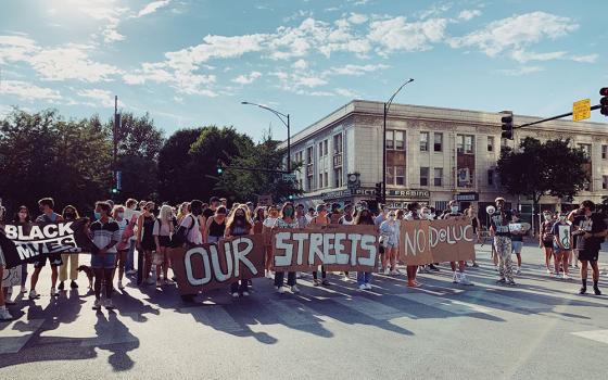 Our Streets LUC demonstrates outside the campus of Loyola University Chicago on Aug. 22. The group has been fighting for the school to cut ties with the Chicago Police Department, among other reforms. (Courtesy of Our Streets LUC)