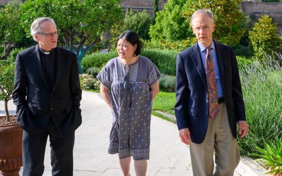 From left: Holy Cross Fr. John Jenkins, Carolyn Woo and Leo Burke in Rome for the June 2019 meeting with fossil fuel executives (University of Notre Dame/Matt Cashore)