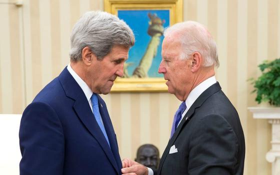 In October 2014, Secretary of State John Kerry talks with Vice President Joe Biden in the Oval Office in Washington, D.C. (Flickr/Obama White House/Pete Souza)