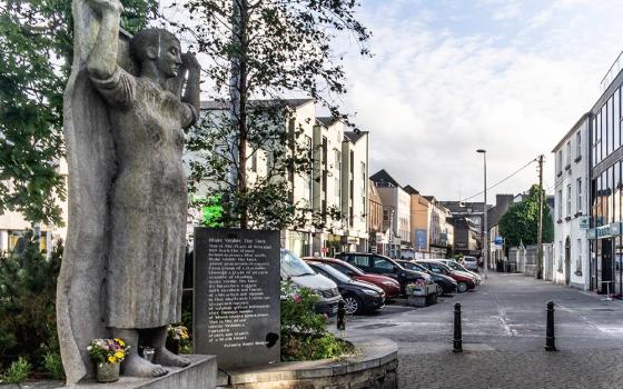 Near a former Magdalene laundry in Galway, Ireland, a memorial with a sculpture by Mike Wilkins and a plaque with a poem by Patricia Burke Brogan honors the women who were held such institutions. (Flickr/William Murphy)